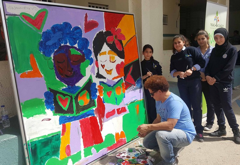 Teach a Child adds the colour of optimism to young lives with world famous artist Romero Britto